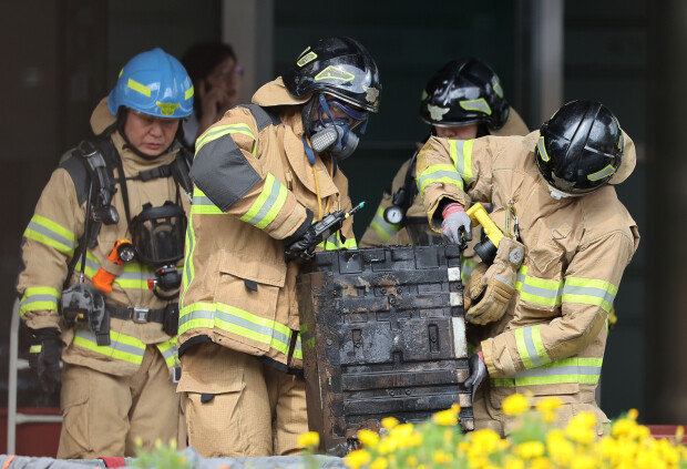 Police book four over state data center fire