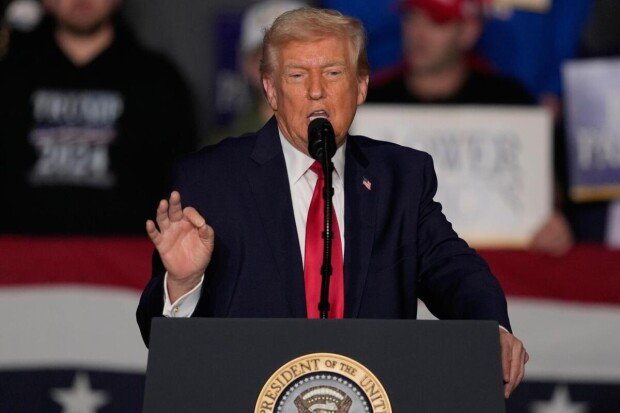 Trump cites economic gains from tariffs