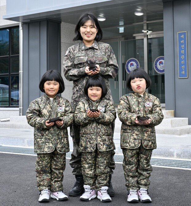 Navy petty officer, triplets donate hair to cancer patients