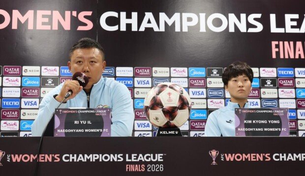 North Korean coach dismisses focus on joint cheering squad
