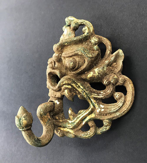 Gilt bronze monster mask found in Hwangyongsa in Gyeongju