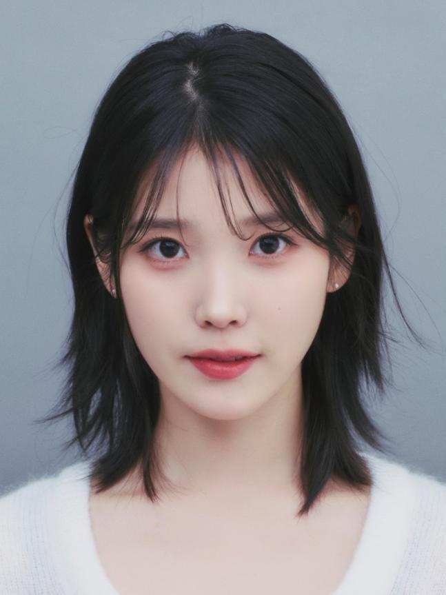 IU donates 225 million won to celebrate 16th anniversary of debut | The  DONG-A ILBO