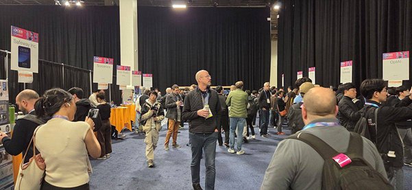 International media and global press delegates explore the exhibition booths of 10 standout startups at the Seoul Integrated Pavilion during CES 2026 / source=SBA