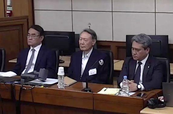Appeals court sentences Yoon to seven years