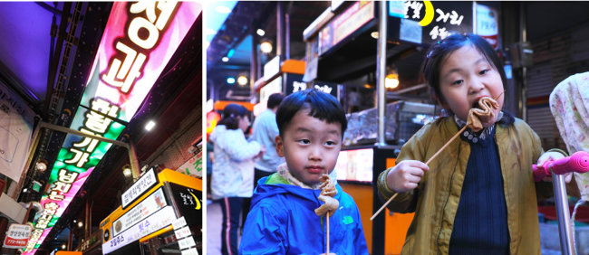 인천 송현시장에 설치된 LED 조명이 한밤의 시장에 활기를 불어넣는다.(왼쪽) 야시장에선 어린이들도 즐겁다. [박해윤 기자]