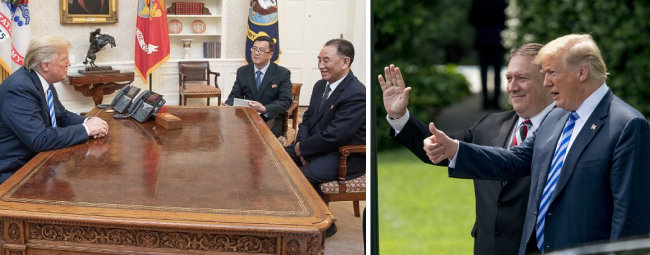 6월 1일 김정은 북한 국무위원장의 친서를 들고 온 김영철 노동당 부위원장과 백악관 집무실에서 대화하는 트럼프 미국 대통령(왼쪽). 두 손을 가지런히 모으고 있다. 트럼프는 김영철을 손수 배웅하면서 엄지손가락을 치켜들기도 했다. [뉴시스]