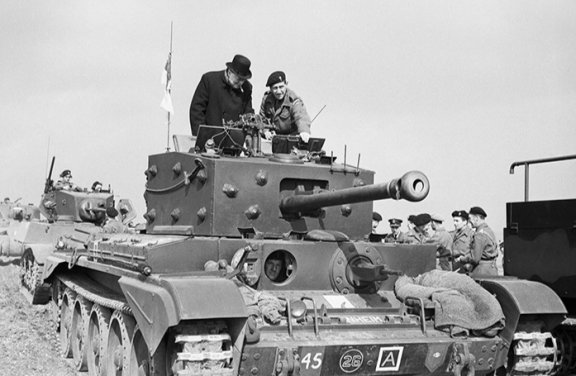 제2차 세계대전 중이던 1944년 3월 31일, 윈스턴 처칠이 영국 요크셔 피커링 지역에서 웰시 근위대 제2대대(기갑정찰) 2중대 소속 크롬웰 Mk IV 전차를 사열하고 있다. 위키피디아