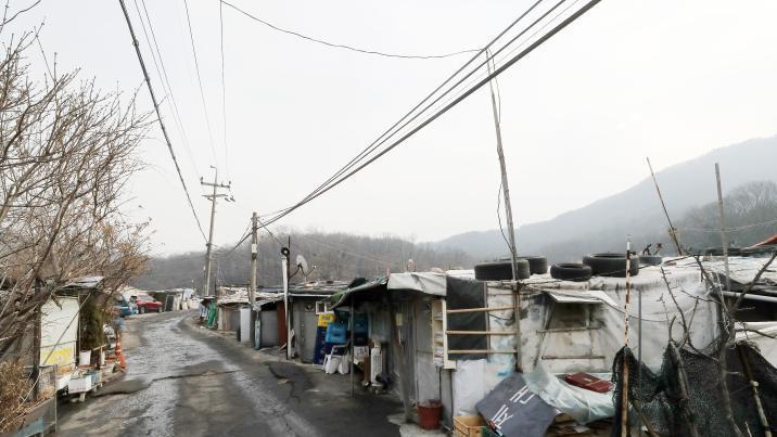 ‘마지막 판자촌’ 구룡마을 강제이주 추진… SH “명도소송”