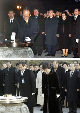 열린우리당 이부영 의장을 비롯한 당직자들(위)과 한나라당 박근혜 대표 등 당직자들이 1일 오전 각각 서울 동작동 국립묘지를 참배했다. 국회사진기자단