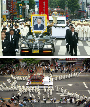24일 대한제국의 마지막 황세손인 이구(李玖.전주이씨 대동종약원 명예총재)씨의 장례가 엄수된 가운데 장례행렬이 종묘 앞을 지나고 있다. [연합]