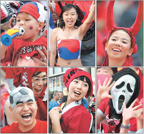 패션은 달라도 열정은 하나“2006 월드컵 포토제닉은 나!” 18일(현지 시간) 독일 라이프치히 첸트랄슈타디온, 19일 새벽 서울시청 앞 서울광장과 광화문 일대에서 응원전을 펼친 붉은 악마들이 저마다 개성 있는 패션과 장식을 뽐내고 있다. 라이프치히=김동주 기자
