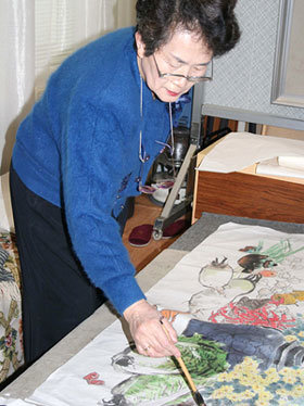 창작중인 북한 김승희 화백