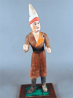 투루판 아스타나에서 출토된 국제 상인 소그드인의 목조각. 7세기, 높이 56.2cm.