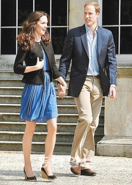 지난달 29일 결혼식 후 윌리엄 왕세손 커플이 버킹엄 궁을 걷고 있다. 데일리메일 제공