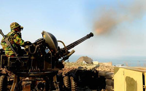 연평도에 배치된 발칸포에서 사격을 하고 있는 모습 국방부 제공