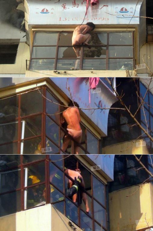 7층에서 속옷만 입은 채 구조되는 여성(사진= 봉황망)