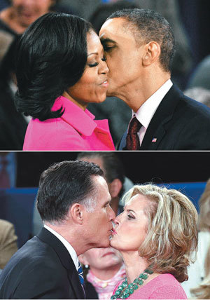 “여보, 내가 잘했지?” 16일 미국 대선후보 2차 토론회에서 치열한 설전을 벌인 버락 오바마 대통령(위 사진 
오른쪽)과 밋 롬니 공화당 후보는 서로 악수도 하지 않고 등을 돌려 부인에게 달려갔다. 오바마 대통령이 미셸 여사의 뺨에, 롬니 
후보가 앤 여사의 입술에 키스를 하고 있다. 90분간 진행된 이날 토론회는 청중이 다양한 질문을 하고 후보들이 대답하는 타운홀 
미팅 방식으로 진행됐다. 롱아일랜드=AFP 연합뉴스