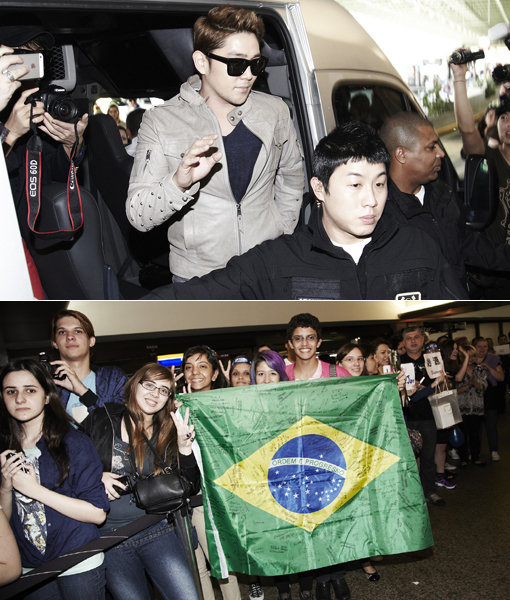 ‘브라질 입성!’ 남미 투어 ‘슈퍼쇼5’를 위해 브라질에 도착한 슈퍼주니어 강인(위쪽 사진)이 팬들(아래쪽 사진)에게 인사를 건네고 있다. 사진제공｜SM엔터테인먼트