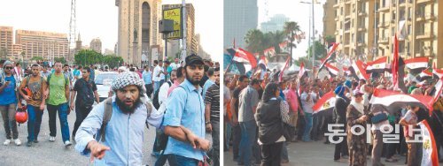 쫓고 쫓기고…



무함마드 무르시 전 이집트 대통령 지지자들이 5일 오후 ‘피의 금요일’ 충돌이 일어나기 직전 카이로 타흐리르 광장으로 향하고 있다(왼쪽 사진). 일부 시위자는 각목 등을 들고 있었다. 오른쪽 사진은 6일 타흐리르 광장에 모여 무르시 전 대통령을 반대하는 시민들이 국기를 흔드는 모습. 카이로=김영식 기자 spear@donga.com
