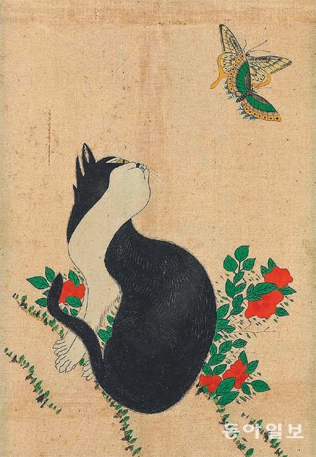 앙증맞은 고양이와 어여쁜 나비를 그린 조선시대 민화 ‘묘접도’. 얼핏 귀여운 동물을 형상화한 듯한 이 그림에는 장수를 기원하는 뜻이 숨어 있다. 돌베개 제공