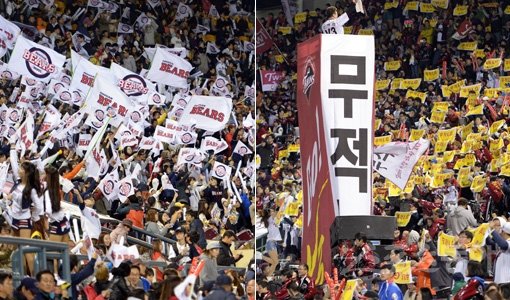 열띤 응원전을 펼치는 LG 팬들과 두산 팬들. 스포츠동아DB