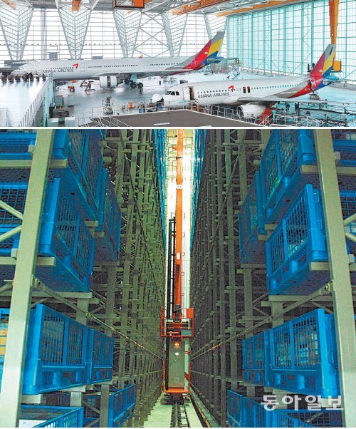 5일 인천 중구 운서동 아시아나항공 ‘인천 제2격납고’에서 이 회사 직원들이 ‘A330-300’(위쪽 사진 뒤쪽)과 ‘A320-200’에 대한 중정비 작업을 동시에 진행하고 있다. 아래쪽 사진은 격납고 부속 건물에 있는 무인(無人) 부품 창고 내부 모습. 아시아나항공 제공