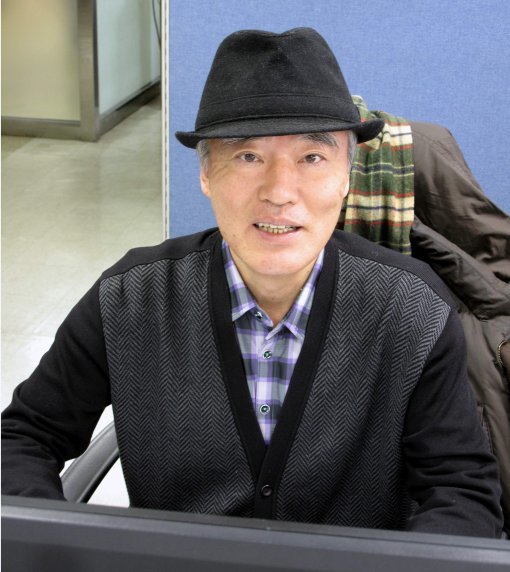 한국기원내 책상에 앉아있는 김달수 AGF사무총장.  한국기원 제공