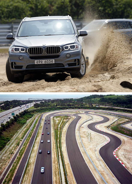 BMW ‘뉴 X5’가 오프로드 코스 중 모래 노면에서 시범 주행을 보이고 있다. 오프로드 프로그램에선 BMW와 미니의 4륜구동 시스템을 체험할 수 있다(위쪽 사진). BMW 드라이빙 센터 트랙을 찍은 항공 사진.