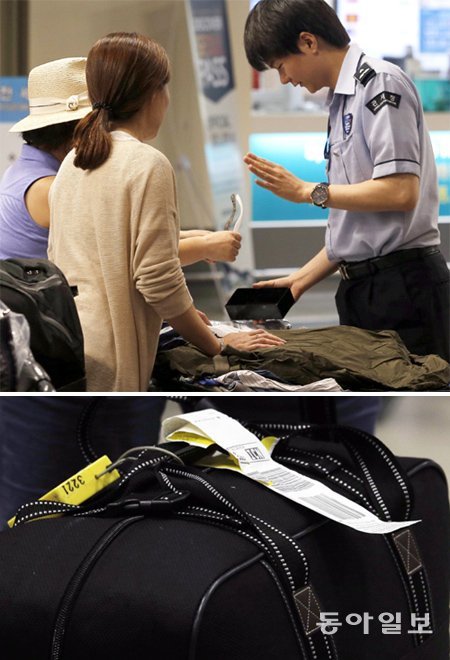 인천공항 세관 직원이 여행객의 가방에 면세한도 초과 물품이 있는지를 검사하고 있다(위 사진). 비행기에서 내린 짐들은 입국장으로 이동하는 동안 전량 X선 검사를 받는다. 그 과정에서 면세한도 초과 물품은 노란색, 마약이나 총기는 빨간색, 식물은 녹색, 동물은 주황색 전자태그가 붙는다(아래 사진). 인천=양회성 기자 yohan@donga.com