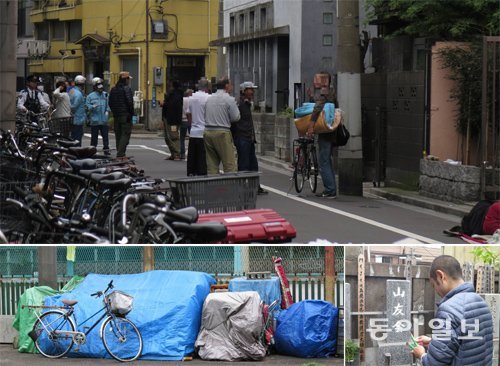 일본 도쿄의 대표적인 빈민가 산야 지역에 출동한 경찰과 주위에 모여든 노숙인들(위 큰 사진). 이 지역 공원에는 노숙인들의 텐트가 10개 이상 모여 있다(왼쪽). 산야에서 활동하는 비영리법인 산유카이의 유이 가즈노리 이사가 무연고 사망자를 위한 공동 납골당 비석 앞에서 향을 피우고 있다. 도쿄=장원재 특파원 peacechaos@donga.com