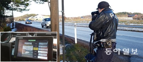 지난달 21일 노르웨이 베스트폴 주의 한 도로에서 잠복 중인 경찰이 과속 차량을 적발하고 있다(큰 사진). 노르웨이 경찰은 암행 
차량에 설치된 자동 번호판 인식 장치(ANPR)를 통해 차량 정기 검사를 받지 않았거나 번호판을 복제한 불법 운전자들을 적발한다.
 베스트폴=박성민 기자 min@donga.com