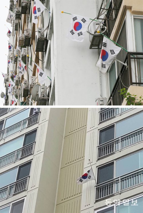 현충일인 6일 서울 강남구 일원동의 한 아파트에 걸린 조기(弔旗)가 빼곡하다(위쪽 사진). 같은 날 서울 용산구 이촌동의 한 아파트에는 태극기를 게양한 집이 10곳 중 1곳 수준이었다. 안철민 acm08@donga.com·김예윤 기자