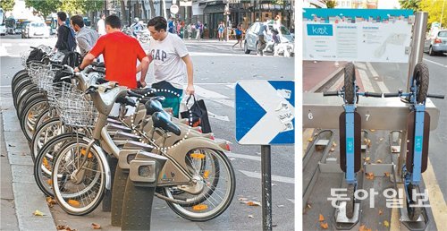 프랑스 파리 시민들이 24일 공공자전거 벨리브를 이용한 뒤 주차하고 있다. 자전거 안장이 뒤쪽을 향하고 있는 것은 고장이라는 
신호다(흰색 점선 안). 오른쪽은 6월부터 파리 남쪽 외곽 몽루주에서 시범 운행 중인 공공 킥보드. 파리=동정민 특파원 
ditto@donga.com