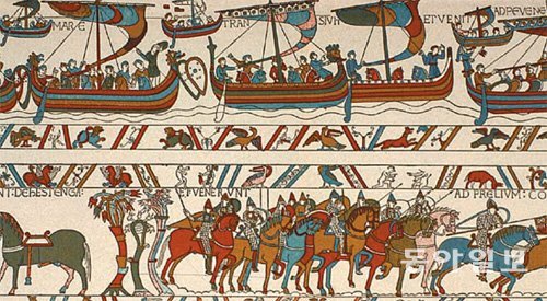 1066년 헤이스팅스 전투 이후의 노르만 왕조 영국사를 그림으로 담아낸 ‘바이외 태피스트리’의 일부 모습. 950여 년만에 처음으로 프랑스를 떠나 영국에 임대 전시 될 예정이다. 동아일보DB