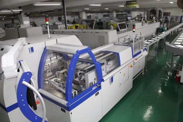 팩컴코리아㈜가 자랑하는 최신형 양장설비.