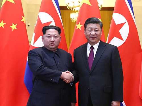 김정은과 시진핑.
