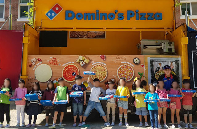 18일 대구 달성군 세천초에서 도미노피자의 찾아가는 피자교실 ‘도미노 파티카’ 행사가 열렸다.