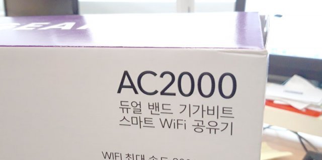 공유기 패키지에 적힌 \'AC2000\' 문구(출처=IT동아)