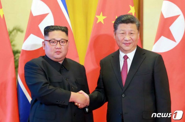 북한 노동신문이 김정은 국무위원장의 세 번째 방중 소식을 20일 보도했다. (노동신문) 2018.6.20/뉴스1 © News1