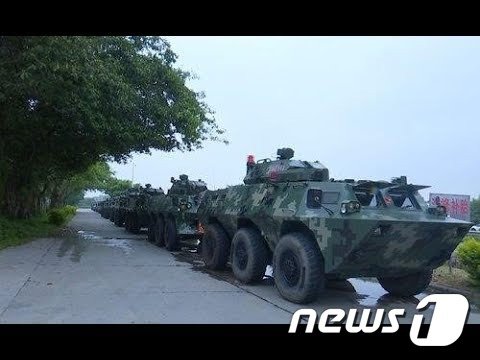 글로벌타임스에 올라온 장갑차 행렬. 장갑차 수십대가 중국 푸젠성과 광저우에서 홍콩 인근인 선전시로 향하고 있다. © 뉴스1