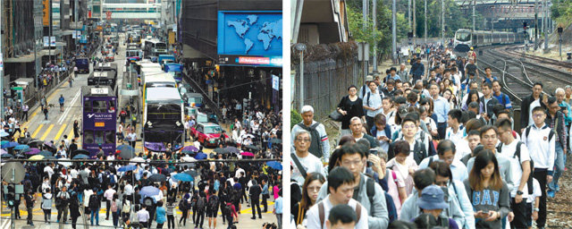 버스도 지하철도 ‘스톱’ 12일 홍콩에서 반중 반정부 시위대가 대중교통 방해 시위에 나서면서 출근길 ‘교통대란’이 벌어졌다. 이날 오전 홍콩 도심 센트럴 지역에서 시위대가 도로를 점거해 버스 운행이 중단됐다(왼쪽 사진). 시위대의 지하철 운행 방해로 지하철 차량에서 내린 승객들이 선로를 따라 걷고 있다. 홍콩=AP 뉴시스
