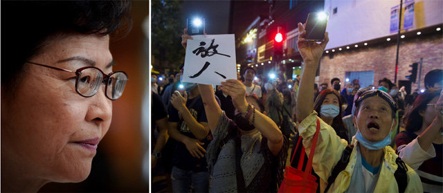 홍콩의 앞날은? 26일 캐리 람 홍콩 행정장관이 기자회견을 열고 “24일 구의원 선거 패배에도 불구하고 행정장관 직선제 실시 등 반중 시위대의 요구를 받아들일 수 없다”고 밝혔다(왼쪽 사진). 시위대는 전날 홍콩이공대 앞에서 스마트폰 불빛을 켜고 교정에 갇힌 시위대의 석방을 외쳤다. 한 여성이 ‘시위대를 석방하라’는 뜻의 ‘방인(放人)’이란 문구를 치켜들고 있다. 홍콩=AP 뉴시스