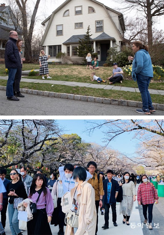멀리 서서 인사하는 美… 코로나 잊은 日 신종 코로나바이러스 감염증(코로나19) 확산으로 미국 뉴저지주 몬트클레어 시민들이 ‘사회적 거리’를 두고 이웃과 이야기를 나누고 있다(위 사진). 반면 일본에선 코로나19에 아랑곳하지 않고 야외 활동을 하는 이들이 적지 않다. 22일 오후 도쿄 다이토구 우에노 공원에 벚꽃을 보기 위해 상춘객들이 몰려 일대가 큰 혼잡을 빚었다. 몬트클레어=AP 뉴시스·도쿄=김범석 특파원 bsism@donga.com