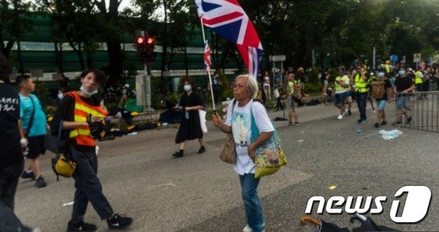 지난해 홍콩 민주화 시위에 참석한 웡. (BBC갈무리)© 뉴스1