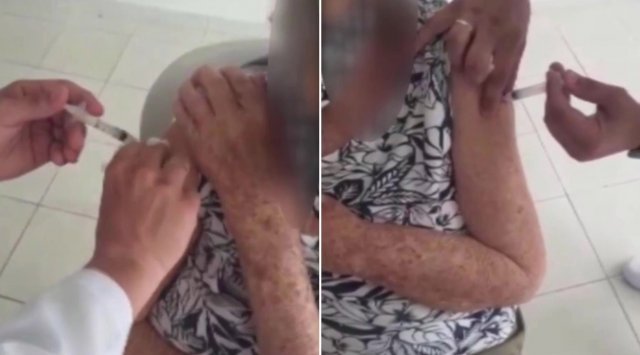 접종 과정을 촬영하던 환자의 가족이 간호사에 ‘제대로 놓으라’ 항의하자, 반대쪽 팔에 다시 놓는 모습. ‘포커스온 뉴스’ 유튜브 갈무리