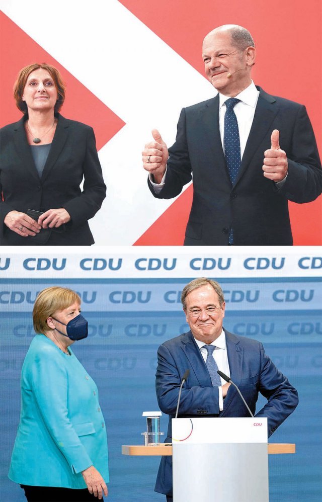 희비 갈린 사민당-기민당 올라프 숄츠 독일 사회민주당 대표(위쪽 사진 오른쪽)가 총선이 실시된 26일 부인과 함께 수도 베를린 당사에서 선거 승리를 확신한다는 의미로 양손 엄지를 치켜들고 있다. 2005년부터 16년간 집권한 앙겔라 메르켈 총리와 아르민 라셰트 기민당 대표(아래쪽 사진 오른쪽) 또한 같은 날 베를린 당사에 나란히 등장했다. 베를린=AP 뉴시스