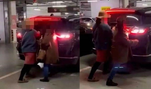 주차하려는 차량을 몸으로 막아선 여성 2명. 웨이보