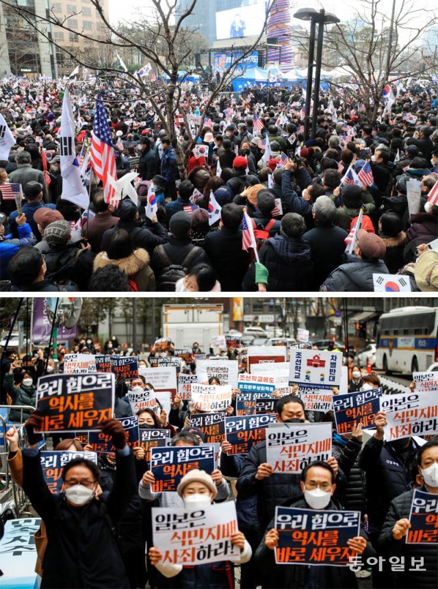 서울도심 곳곳서 ‘3·1절 집회’ 1일 서울 중구 청계광장에서 전광훈 사랑제일교회 담임목사가 개최한 ‘3·1절 광화문
 1000만 국민기도회’ 참가자들이 발 디딜 틈 없이 모여 있다(위쪽 사진). 선거 유세 형태로 열린 이번 집회에는 경찰 추산 
최대 8000여 명의 인파가 몰렸다. 같은 날 서울 종로구 수송동 옛 주한 일본대사관 앞에서 열린 ‘3·1운동 103주년 
민족자주대회’에서 참석자들이 피켓 시위를 벌이고 있다. 전영한 기자 scoopjyh@donga.com·뉴시스