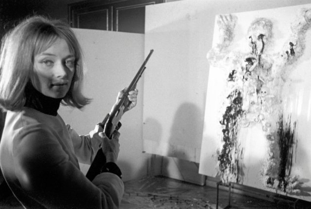 Niki de Saint Phalle shooting at her 1963 work Drle de mort or Gambrinus