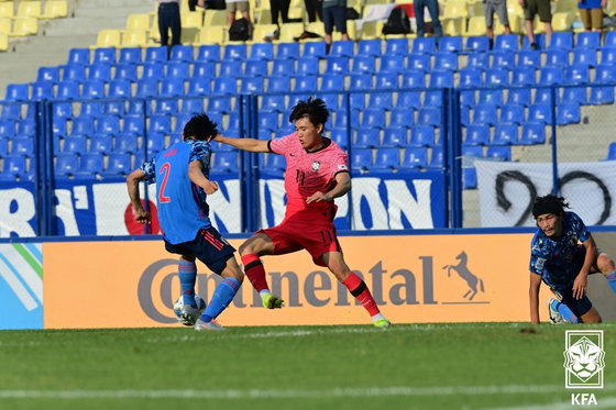 12일 우즈베키스탄 타쉬켄트 파흐타코르 스타디움에서 열린 2022 AFC 아시안컵 8강전 한국과 일본의 경기에서 전반전 한국 양현준이 드리볼 돌파를 하고 있다. (대한축구협회 제공)2022.6.12/뉴스1